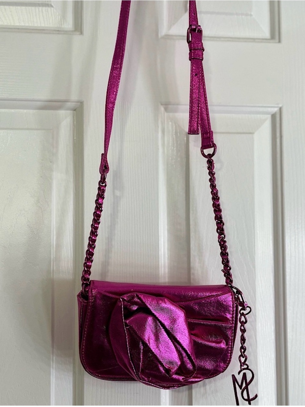 Steve Madden Metallic Fuchsia Crossbody Bag with flower Detail
